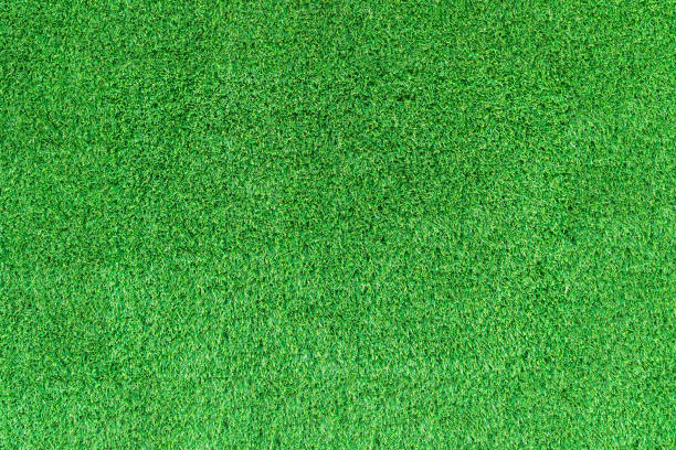 istock Artificial green grass texture for golf course. soccer field or sports background concept design. 861830840