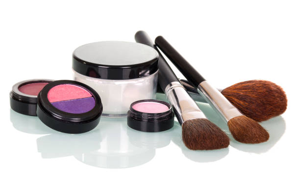 istock Cosmetic tassels, shadows, lip gloss, blush and cream jar isolated on white. 861837792
