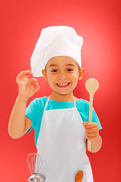 istock Cheerful little chef showing good taste 861841290