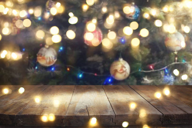 istock Empty table in front of christmas tree with decorations background. For product display montage 861847156