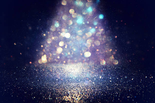 istock glitter vintage lights background. defocused 861847174