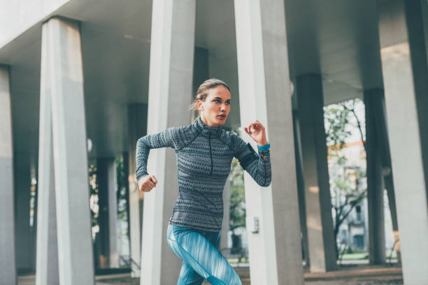 istock Woman jogging outdoors 861853238