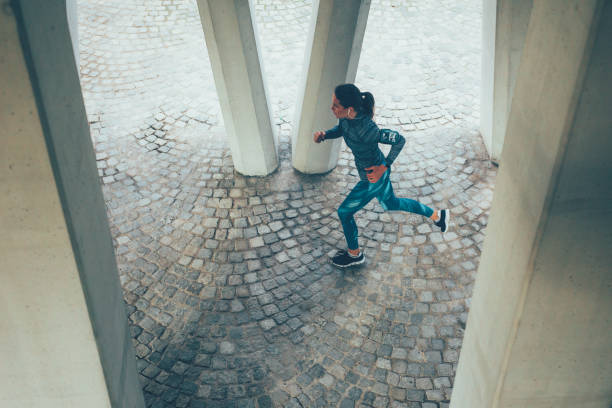 istock Woman jogging outdoors 861853240