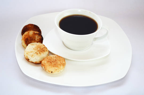 istock Malagasy donuts from Madagascar with coffee: mofogasy (malagasy sweet donuts) and ramanonaka (malagasy salty donuts). 861855072