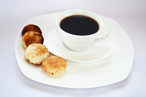 Malagasy donuts from Madagascar with coffee: mofogasy (malagasy sweet donuts) and ramanonaka (malagasy salty donuts).