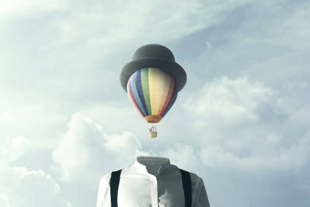 mann mit großen ballon fliegen an seinem kopf, changement konzept - levitation fotos stock-fotos und bilder