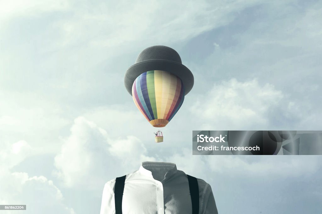 그의 머리, changement 개념에 큰 풍선 비행을 가진 남자 - 로열티 프리 개념 스톡 사진