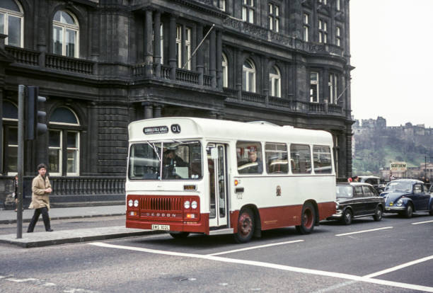 Vintage image of bus waiting at traffic lights on Princes Street in Edinburgh.  Seddon Pennine 102 (registration BWS 102L).