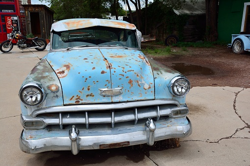 Seligman, Arizona, Usa - July 24, 2017: Rusty abandoned Chevrolet car in Seligman, Arizona.