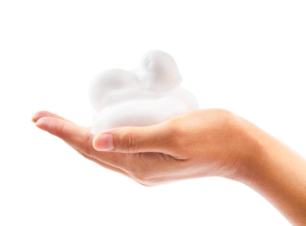 istock close up foam in hand isolated on white 861891238