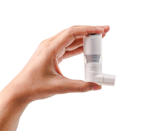 istock Hand holding asthma inhaler 861891258