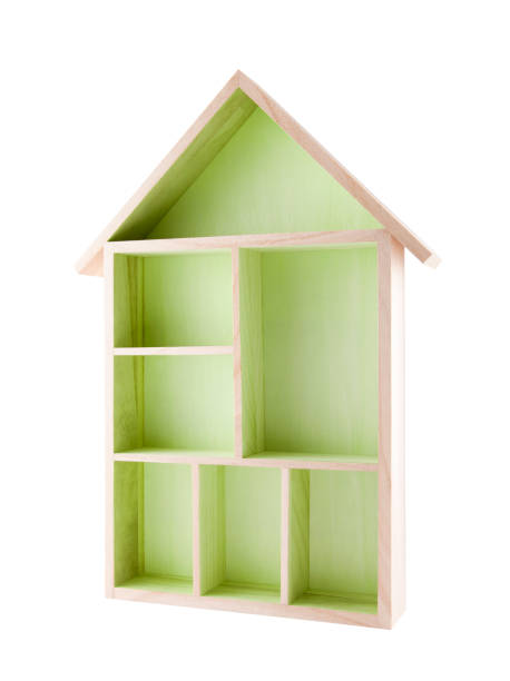istock Green wooden house shaped shelf isolated on white 861891710