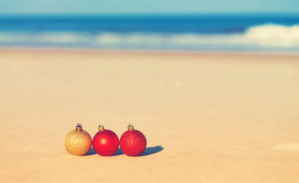 istock Christmas ornaments on a tropical beach 861891978