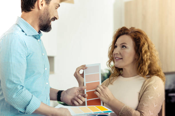 istock Adorable couple thinking about new design for the house 861902666