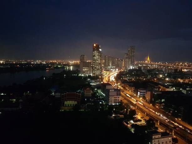 istock City view at night with the bridge at Chao phraya riverside 861907796