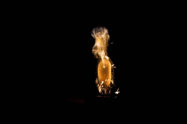 istock Close up view of real sparking light from lighter in dark black background 861920030