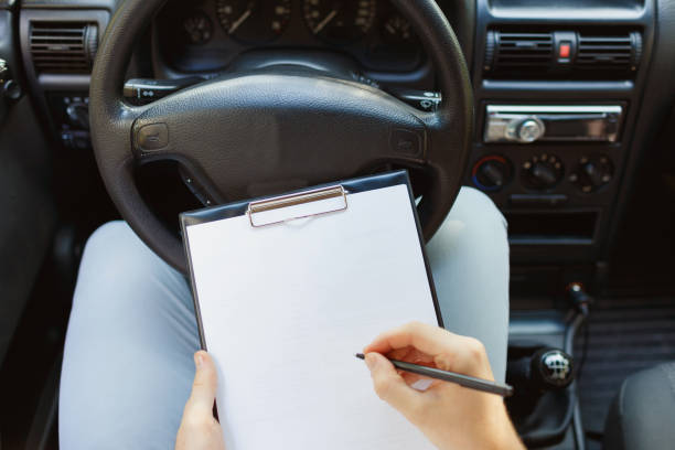 istock Attractive handsome elegant man in a business suit driving an expensive car. 861931320