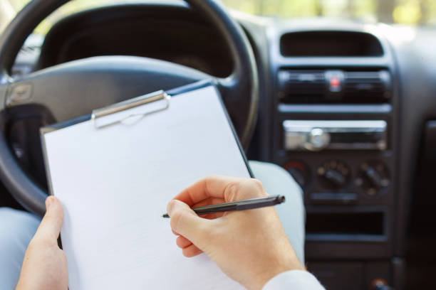 istock Attractive handsome elegant man in a business suit driving an expensive car. 861931368