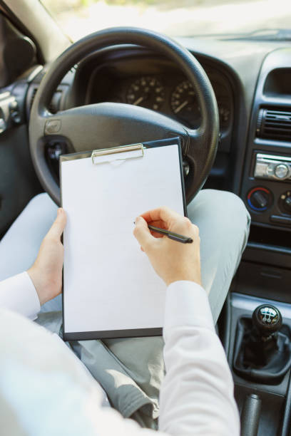 istock Attractive handsome elegant man in a business suit driving an expensive car. 861931482
