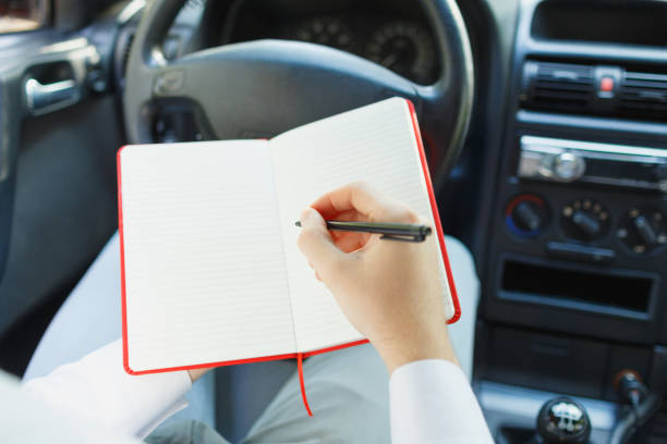 istock Attractive handsome elegant man in a business suit driving an expensive car. 861931532
