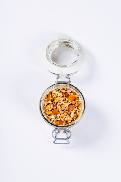 granola de avena casera con frutas y nueces - mixed age flash fotografías e imágenes de stock