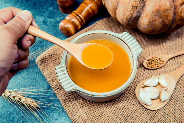 istock pumpkin soup for Halloween and Thanksgiving party 861938078