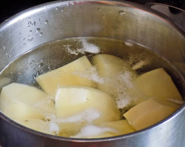 istock cooking potatoes in a cooking pan 861938326