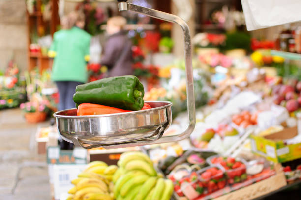 vegetable market stall selling fresh organic produce at greengrocer's in Spanish market stall in Mallorca