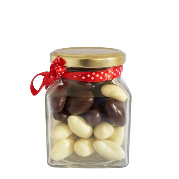 istock Glass jar with chocolate bonbons. 861940198