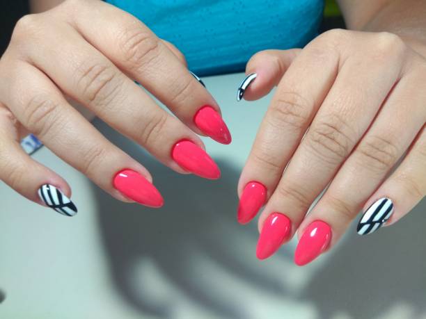 istock Beautiful female hands with colorful nails, nail 861950974