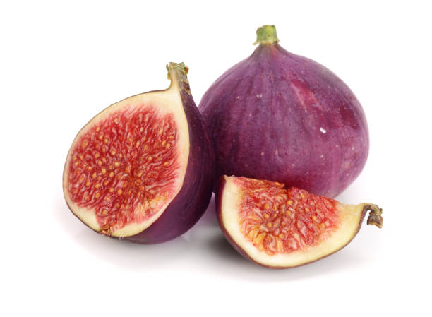 istock fig fruits with half isolated on white background 861951926
