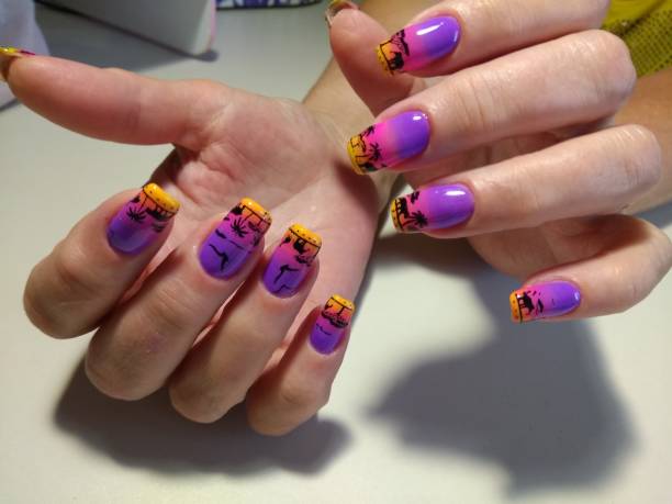 istock manicure design on the nails African sunset 861953880