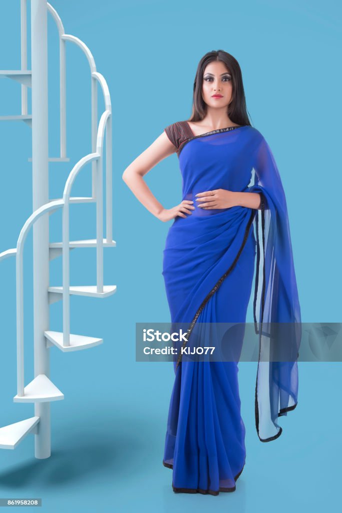 Indian Woman in Blue georgette saree Sari Stock Photo