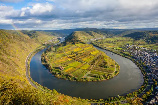 Photo of Calmont Moselle loopLandscape in golden autumn colors and the village Bremm