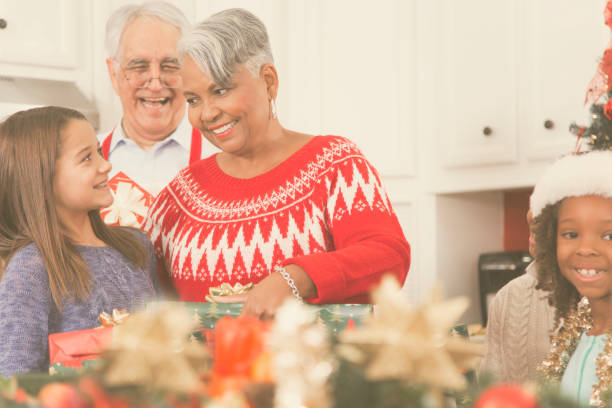 istock Multi-ethnic family in home kitchen at Christmas party. 861962572