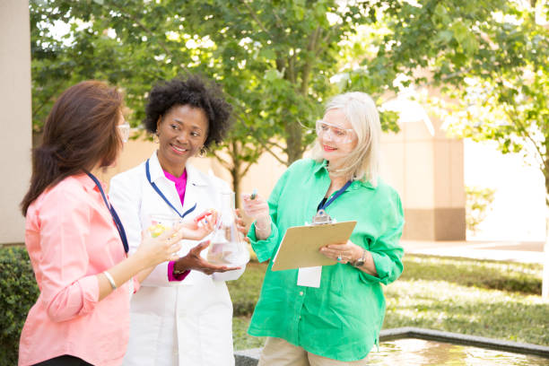 istock STEM themes with female scientists working on water project outdoors. 861966044