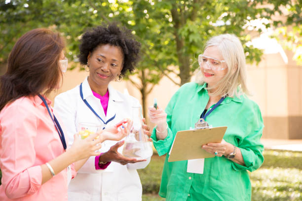 istock STEM themes with female scientists working on water project outdoors. 861966320