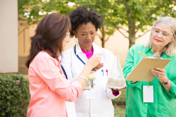 istock STEM themes with female scientists working on water project outdoors. 861966414