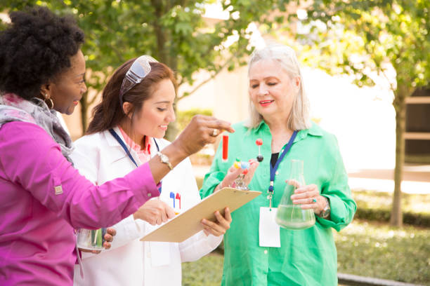 istock STEM themes with female scientists working on water project outdoors. 861966550