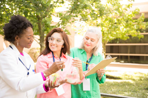 istock STEM themes with female scientists working on water project outdoors. 861966736