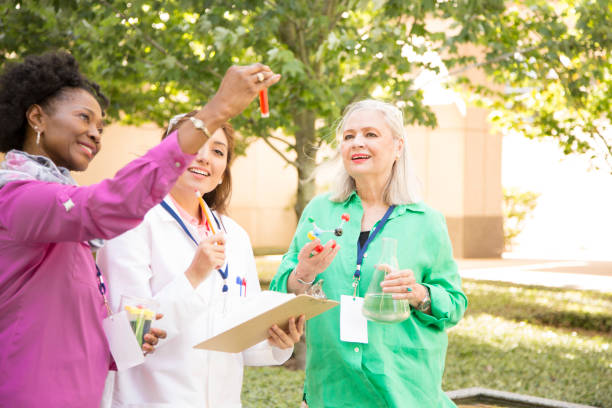 istock STEM themes with female scientists working on water project outdoors. 861966774