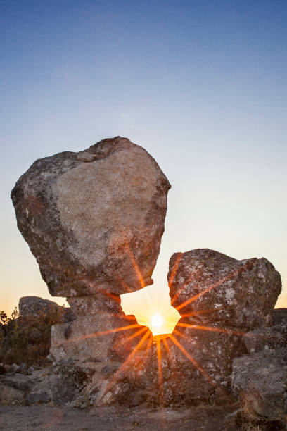 istock Sun rising between megalithic monument, Montanchez, Spain 861971420