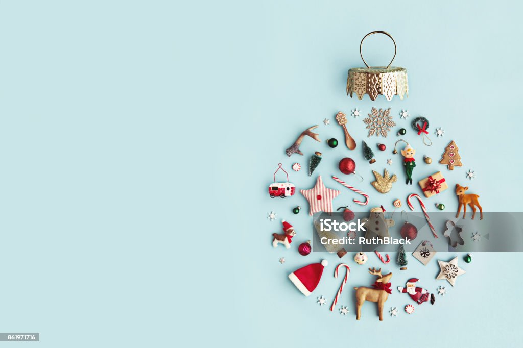 Christmas ornament flat lay Christmas objects laid out in the shape of a Christmas bauble, overhead view Christmas Stock Photo