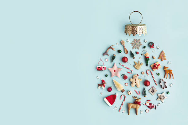 Christmas ornament flat lay Christmas objects laid out in the shape of a Christmas bauble, overhead view hoofed mammal photos stock pictures, royalty-free photos & images