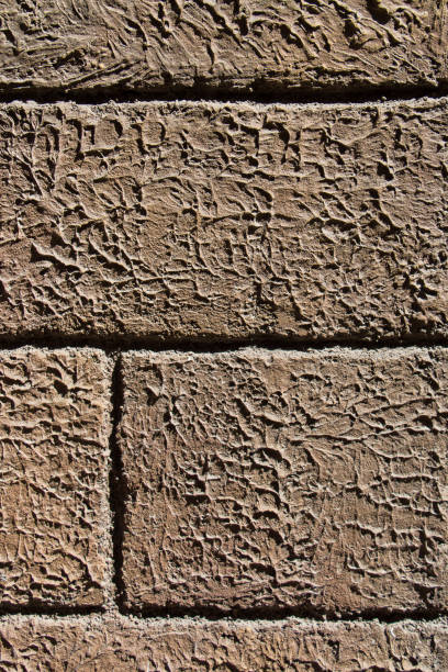 istock Wall made of the same type of stones 861971764