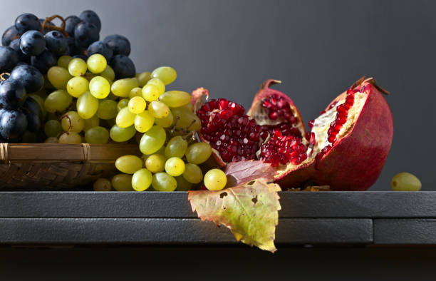 istock Blue and white grapes with pomegranate 861975382
