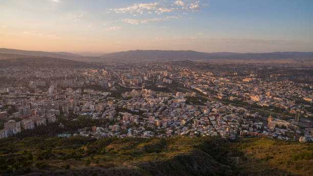 istock panoramic view of city Tbilisi in pink sunset 861976162