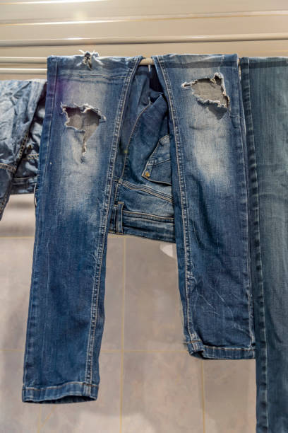 istock clean jeans hanging in bathroom 861978484