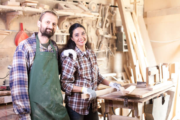 istock Couple manual workers working in atelier 861978876