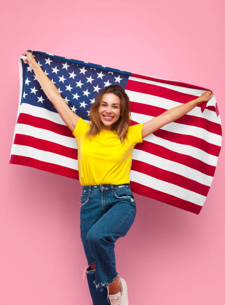 istock Cheerful girl posing with flag 861979018